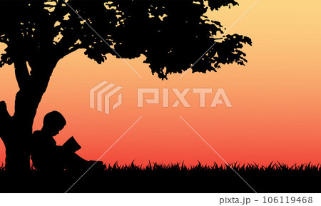 Kid reading book under the tree in park Kid reading book under the tree in park 106119468
