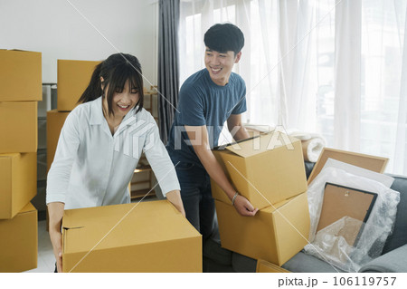 Asian young happy new married couple moving to their new house or real estate. 106119757