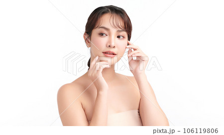 Beautiful young asian woman with clean fresh skin on white background, Face care, Facial treatment, Cosmetology, beauty and spa, Asian women portrait. Beautiful young asian woman with clean fresh skin on white background, Face care, Facial treatment, Cosmetology, beauty and spa, Asian women portrait. 106119806