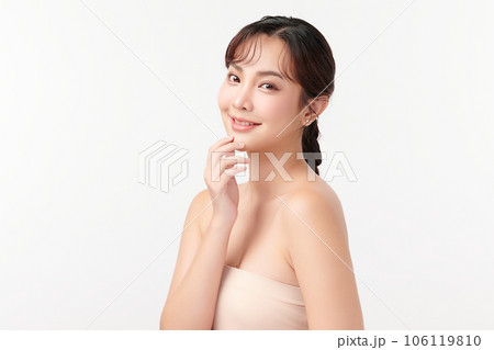 Beautiful young asian woman with clean fresh skin on white background, Face care, Facial treatment, Cosmetology, beauty and spa, Asian women portrait. Beautiful young asian woman with clean fresh skin on white background, Face care, Facial treatment, Cosmetology, beauty and spa, Asian women portrait. 106119810