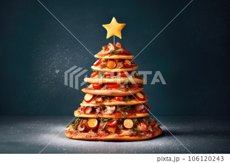 Christmas tree of pizza with a star.  106120243