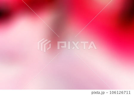 蛍光ピンクから桜色と変化するパワーストーンの断面グラデーション・ボケイメージテクスチャー 106126711