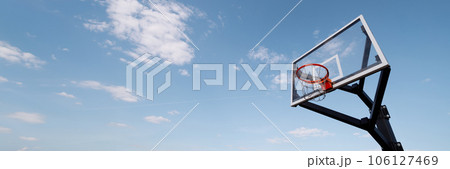 Basketball board in a blue sky background 106127469