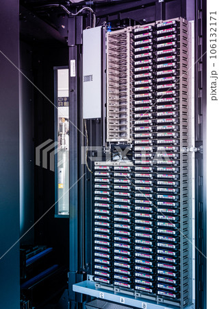 cluster of hard drives stacked inside data storage cabinet cluster of hard drives stacked inside data storage cabinet 106132171