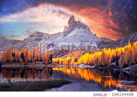 Incredible purple sunrise on Federa Lake in the Dolomite Apls 106134406