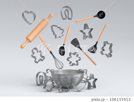 Metal bowl with bowl and cookie cutters on white background 106135913