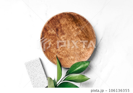 Mockup wooden plate for body care essentials products presentation. Mockup wooden plate for body care essentials products presentation. 106136355