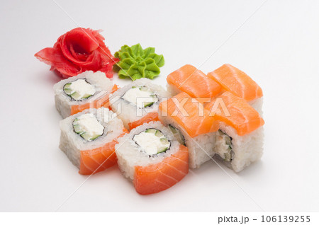 classic rolls with philadelphia cheese and cucumber on a light background 106139255