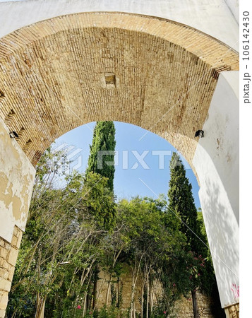 View of historical street in the old town Faro, Algarve, Portugal.  106142430