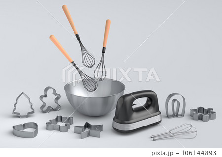 Metal bowl with bowl and cookie cutters on white background 106144893