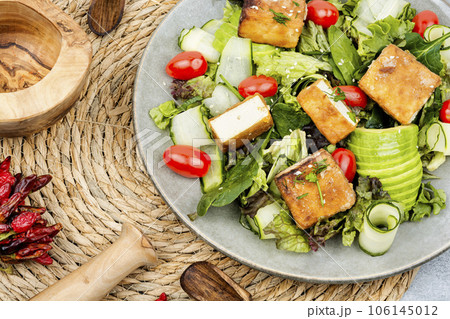 Salad with fresh vegetables and tofu. Salad with fresh vegetables and tofu. 106145012