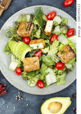 Salad with fresh vegetables and cheese. 106145013