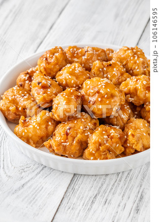 Bowl of orange chicken 106146595