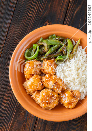 Bowl of orange chicken 106146602