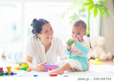 Baby boy playing with toy 106148749