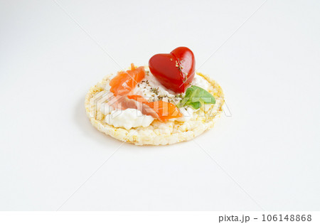 corn cake with cream cheese, salmon and Cherry tomatoe shaped of heart 106148868