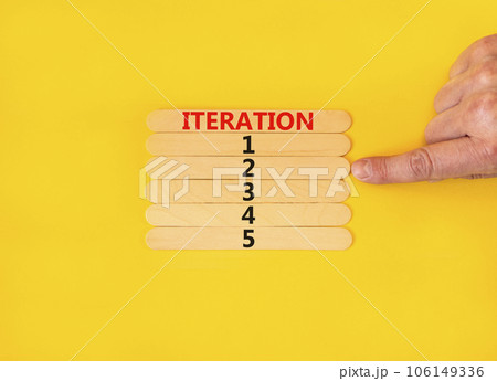 Time to iteration 2 symbol. Concept word Iteration 1 2 3 4 5 on wooden sticks. Businessman hand. Beautiful yellow table yellow background. Business planning and time to iteration 2 concept. Copy space Time to iteration 2 symbol. Concept word Iteration 1 2 3 4 5 on wooden sticks. Businessman hand. Beautiful yellow table yellow background. Business planning and time to iteration 2 concept. Copy space 106149336