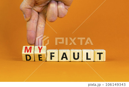 Default is my fault symbol. Concept words Default and My fault on wooden cubes. Beautiful orange table orange background. Businessman hand. Business default is my fault concept. Copy space. Default is my fault symbol. Concept words Default and My fault on wooden cubes. Beautiful orange table orange background. Businessman hand. Business default is my fault concept. Copy space. 106149343