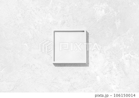 Flat lay cosmetic product presentation scene made with square podium on concrete background. Studio photography, top view. Flat lay cosmetic product presentation scene made with square podium on concrete background. Studio photography, top view. 106150014