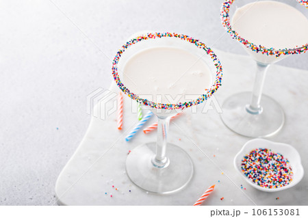 Birthday cake martini with sprinkles on rim Birthday cake martini with sprinkles on rim 106153081