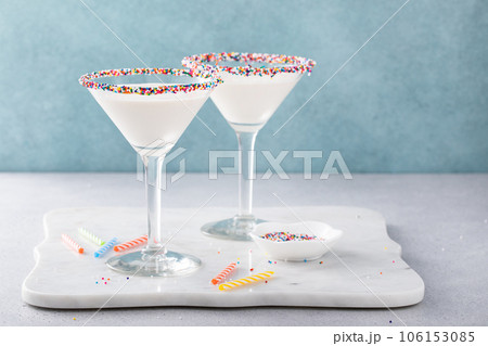 Birthday cake martini with sprinkles on rim Birthday cake martini with sprinkles on rim 106153085