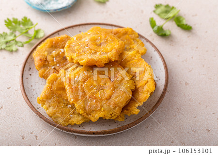 Tostones, traditional Carribean dish, twice fried plantains 106153101
