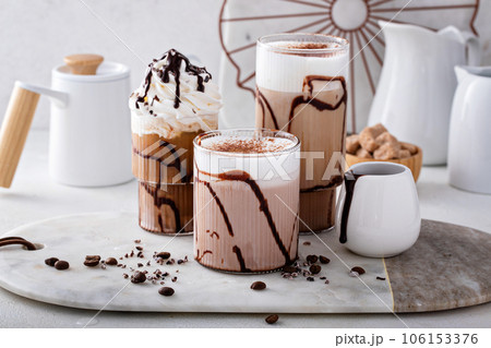 Mocha latte and iced frappe, refreshing and sweet coffee drinks Mocha latte and iced frappe, refreshing and sweet coffee drinks 106153376