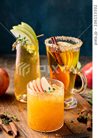 Variety of fall cocktails or mocktails made with apple cider Variety of fall cocktails or mocktails made with apple cider 106153502