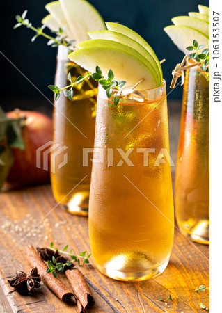 Apple cider mimosa for fall brunch, autumn cocktail idea 106153507