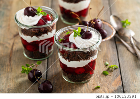 Black forest trifles, dessert in jars concept 106153591