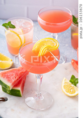 Watermelon and citrus cocktail with lemon garnish 106153670