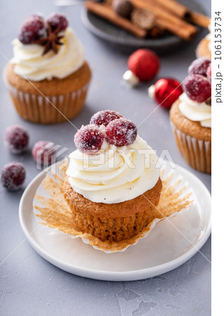 Sugared cranberry spiced cupcakes with cream cheese frosting 106153734
