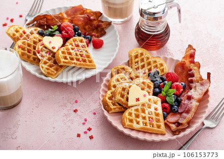 Valentines day breakfast for two with waffles heart shaped Valentines day breakfast for two with waffles heart shaped 106153773