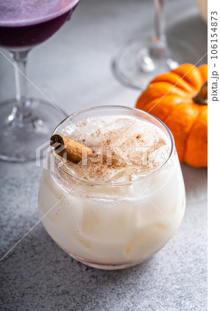 Fall cocktails, cinnamon horchata in a glass with cinnamon stick Fall cocktails, cinnamon horchata in a glass with cinnamon stick 106154873