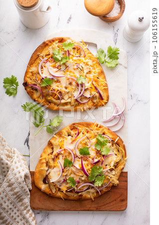 Barbeque chicken flatbread with cheese and red onion Barbeque chicken flatbread with cheese and red onion 106155619
