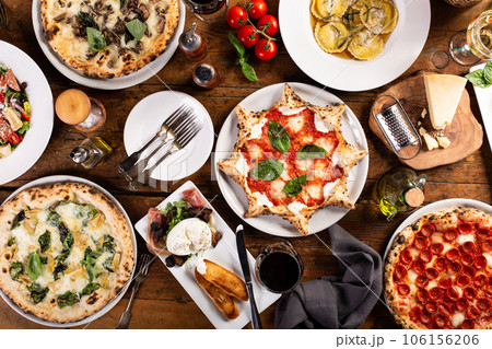Variety of italian food on the table, pizza, pasta and appetizers 106156206