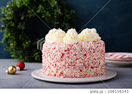 Peppermint bark and chocolate cake for Christmas on a festive background Peppermint bark and chocolate cake for Christmas on a festive background 106156243