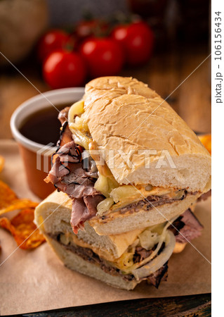 Italian beef sandwich au jus in a bowl 106156434