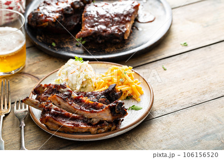 Barbeque meal with ribs and side dishes Barbeque meal with ribs and side dishes 106156520