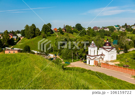 View from the Maloyaroslavets settlement to the surrounding rural landscape with a chapel and houses, Maloyaroslavets, Russia View from the Maloyaroslavets settlement to the surrounding rural landscape with a chapel and houses, Maloyaroslavets, Russia 106159722