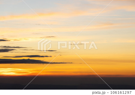 colorful dramatic sky with cloud at sunset 106161297