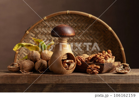 Walnuts on an old wooden table. Walnuts on an old wooden table. 106162159