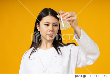 Asian girl doctor in a white coat Asian girl doctor in a white coat 106162239