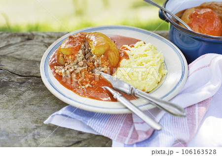 Stuffed peppers in tomato sauce Stuffed peppers in tomato sauce 106163528