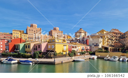 Walk through the streets and canals of the port of Saplaya on a sunny day. Moored yachts and boats at the bright facades of houses. Spain Walk through the streets and canals of the port of Saplaya on a sunny day. Moored yachts and boats at the bright facades of houses. Spain 106166542