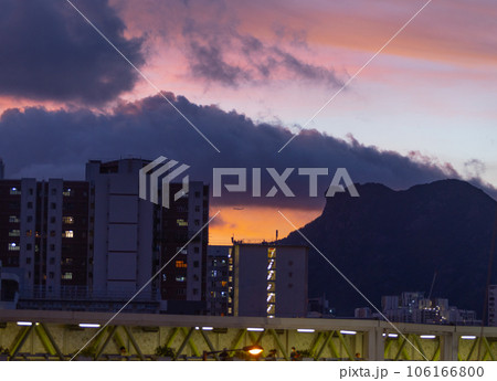 sunset of hong kong and mountain range of lion rock 106166800