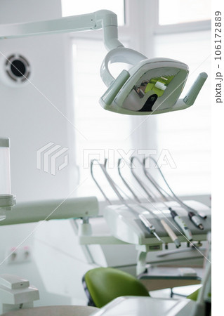 Modern dental office. Dentist's tools for dental treatment. Workplace of a dentist in a clinic 106172889