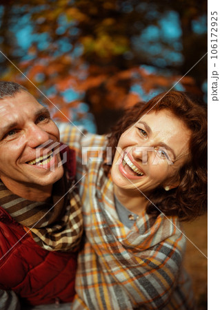 cheerful modern family in park having fun time 106172925