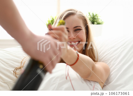 woman take bottle of wine unhealthy way of life woman take bottle of wine unhealthy way of life 106173061