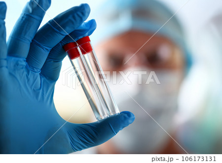 Male scientist hold in arm empty vials closeup Male scientist hold in arm empty vials closeup 106173131